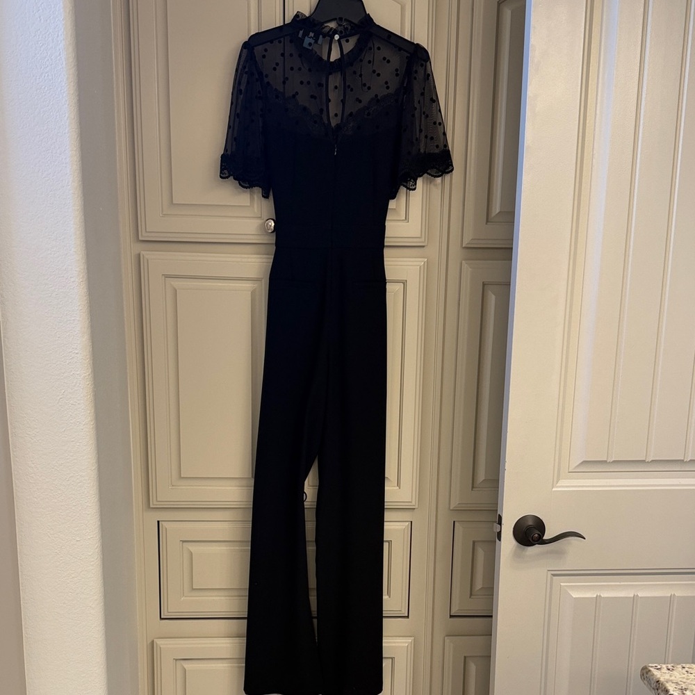 CeCe Black Jumpsuit with Sheer Polka Dot Sleeves